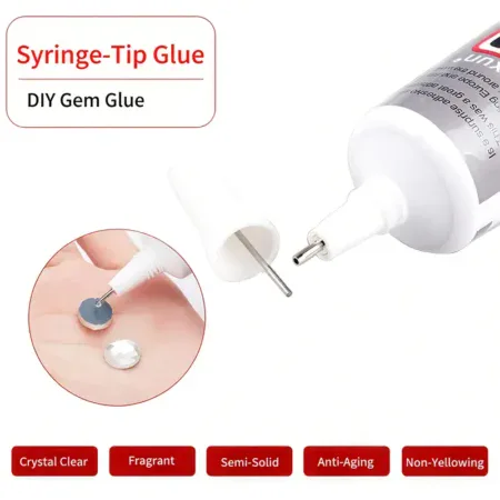 Syringe-tip glue tube with applicator for DIY gemstone decoration and crafts.