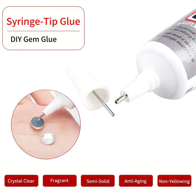 Syringe-tip glue tube with applicator for DIY gemstone decoration and crafts.